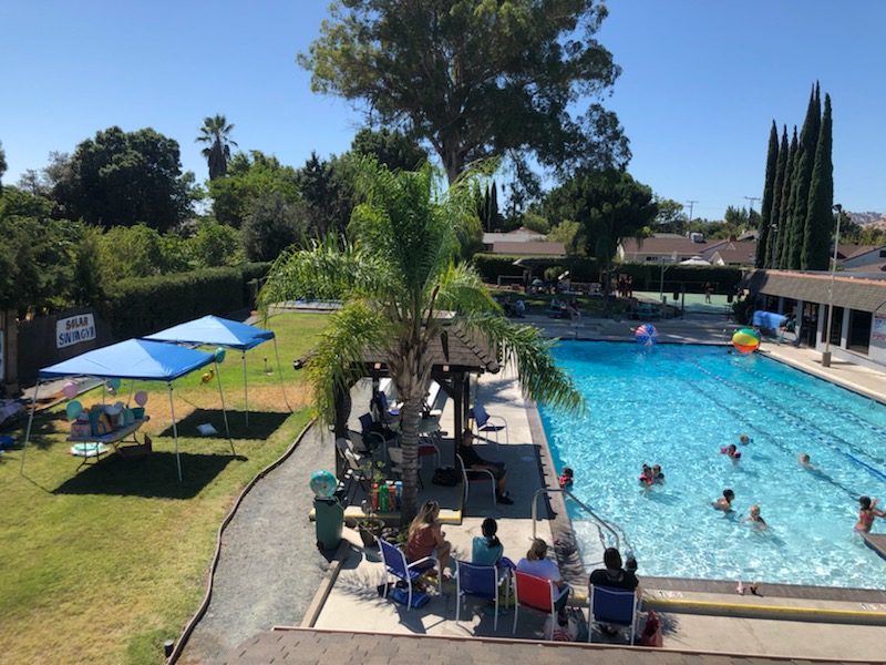 kids playing in the pool for the pool party