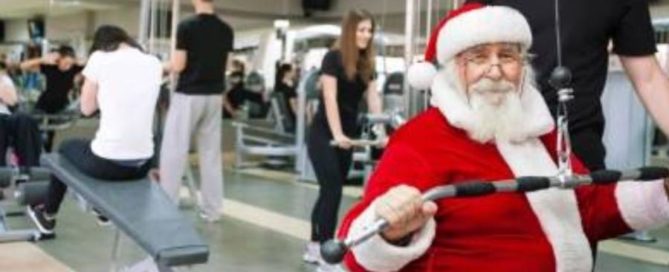 a picture of a Santa working out in the gym
