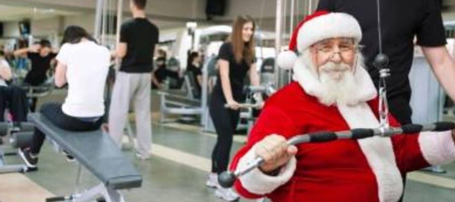 a picture of a Santa working out in the gym
